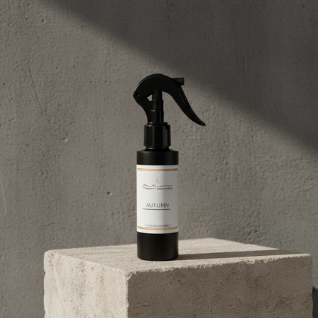 Autumn Moon Candle 4oz Room Spray in scent Autumn sitting on concrete block