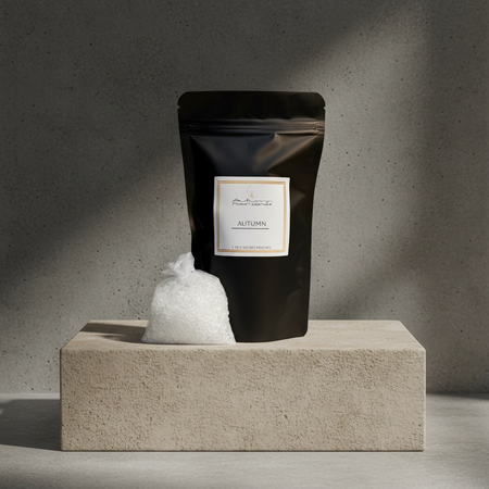 Autumn Moon Candle sachet in the scent Autumn in a black bag sitting on a stone pedestal