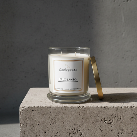 Autumn Moon CandlePalo Santo Candle sitting on stone pedestal