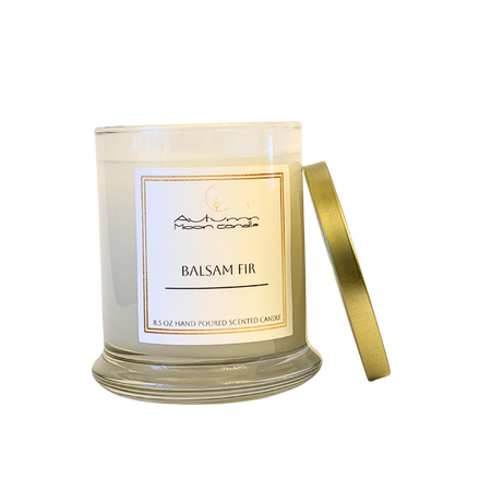 Hand poured balsam fir candle with pine needles wood musk notes