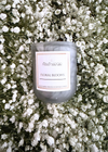 Autumn Moon Candle Floral Blooms  10oz candle sitting in flowers