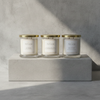 3 Autumn Moon Candles in scents Autumn, Pumpkin Pie Spice and Balsam Fir on concrete block