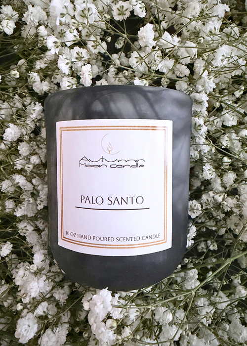 Autumn Moon Candle candle with a label thats says Palo Santo 10oz Candle