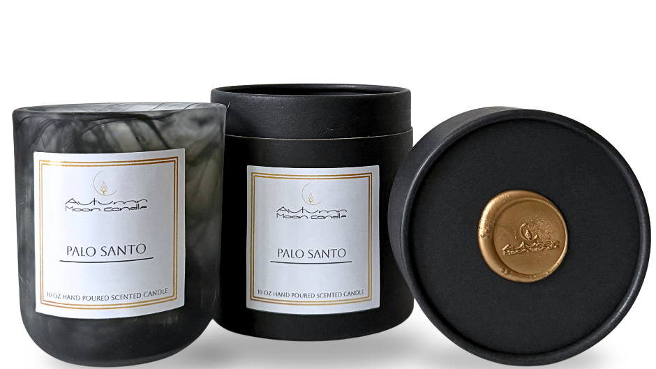 Autumn Moon Candle black candle with a label that says Palo Santo 10oz hand poured scented candle
